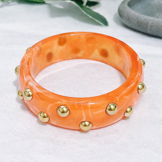 Bracelet rigide  effet marbré & clous acier doré